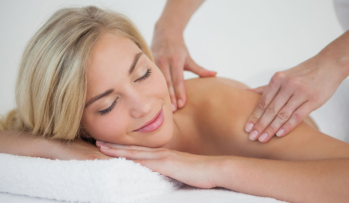 A person getting a massage at the SPA Sunset Marquis. 