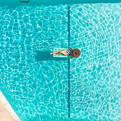 Woman enjoying a private pool