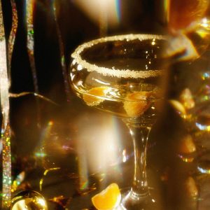 Golden, Celebratory Cocktail with Fruit
