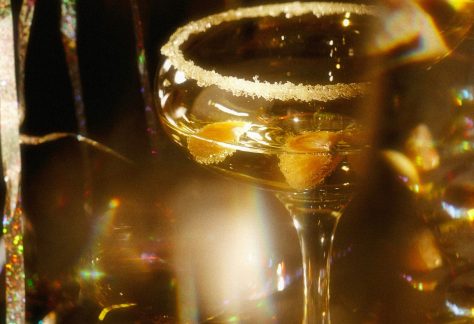 Golden, Celebratory Cocktail with Fruit