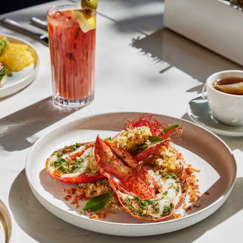 Lobster and rice entrée with a cocktail